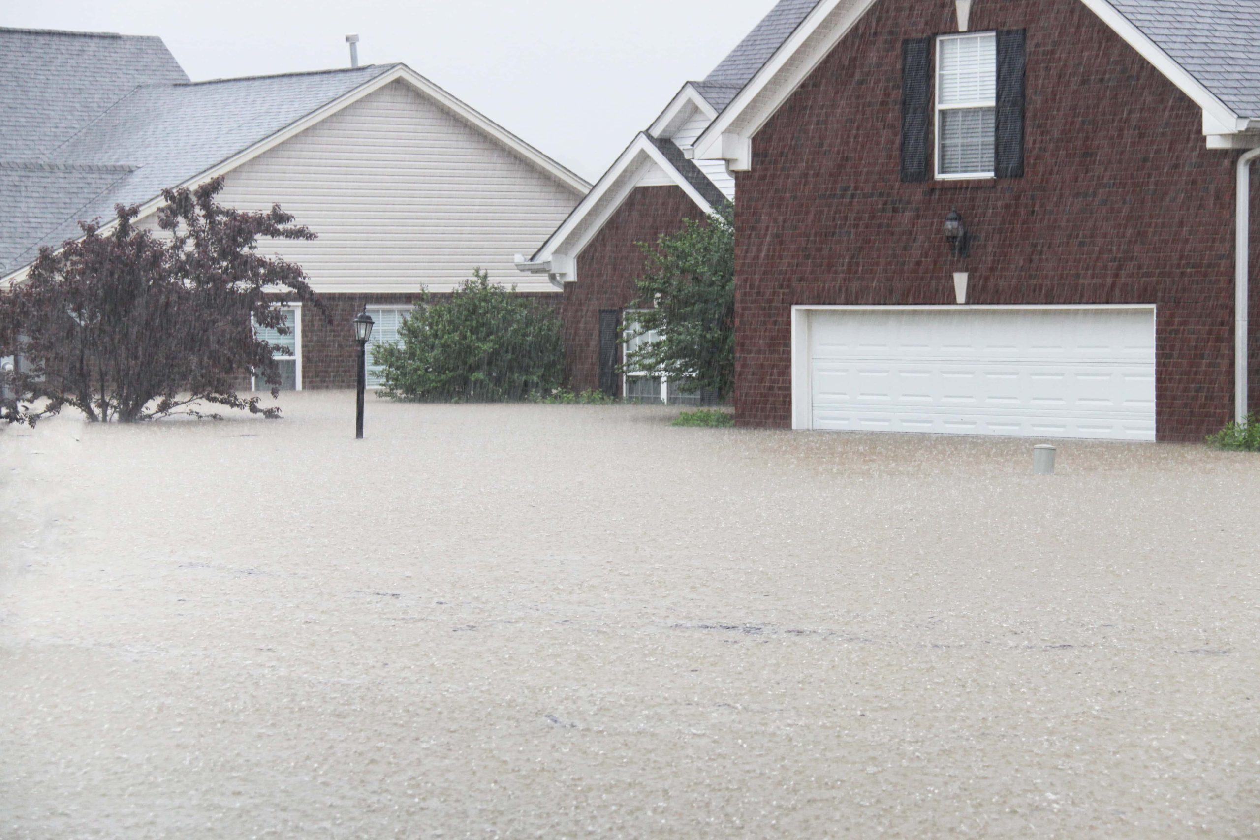 Flooded home in Milwaukee showing property damage for insurance claim assistance